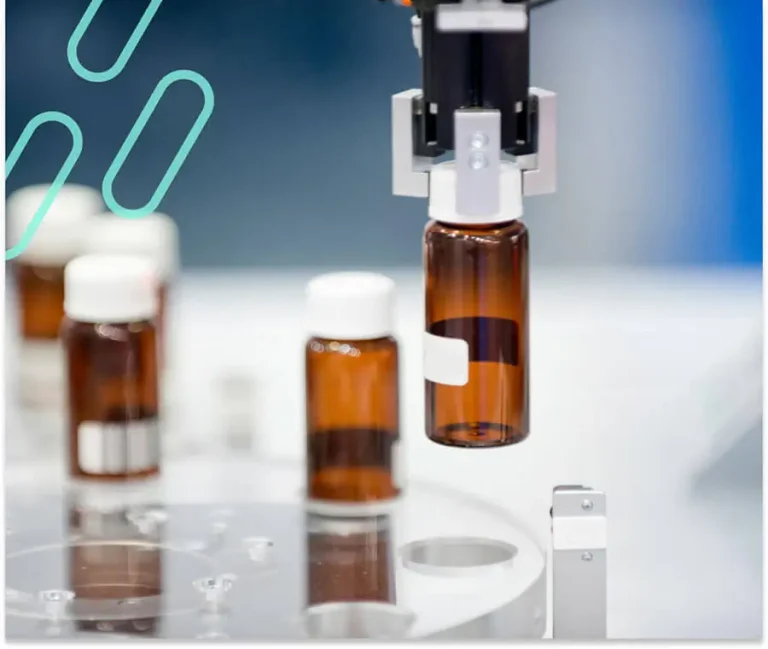 An image of an Automated Dispensing System filling up a prescription bottle.