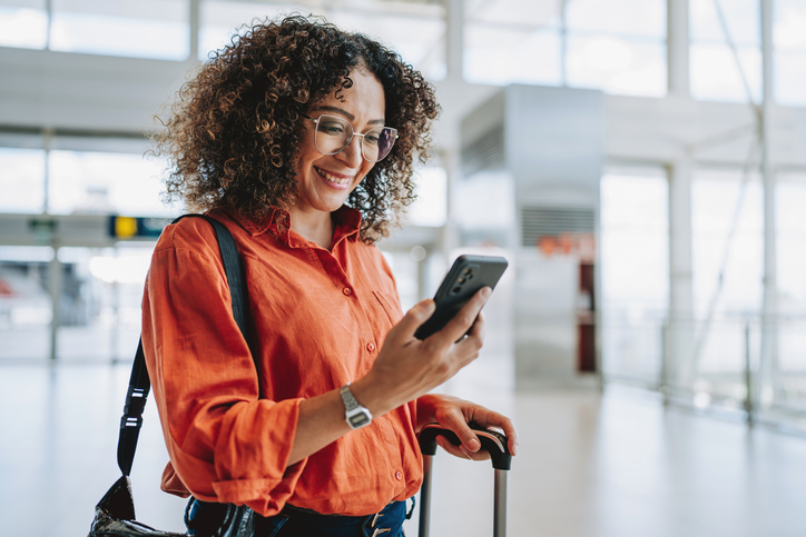 Pharmacist traveling in the airport to a travel assignment.